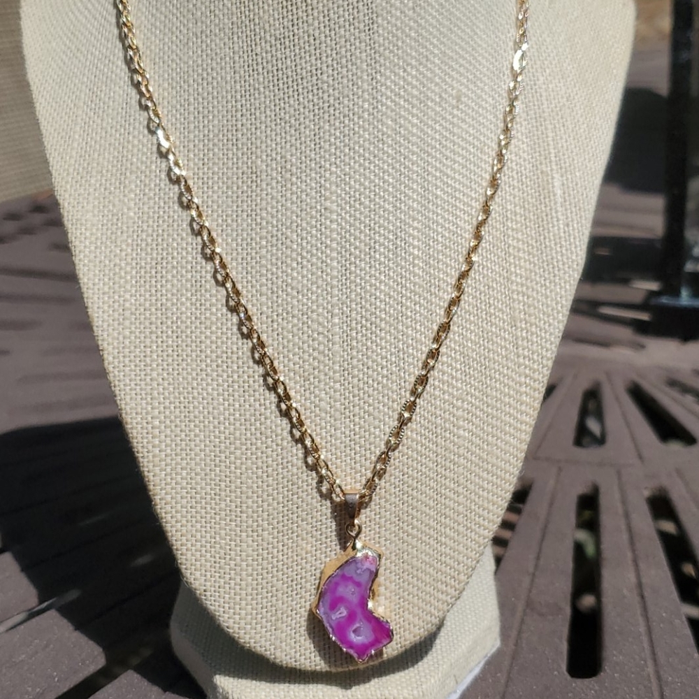 Gold plated necklace with Pink stone charm.